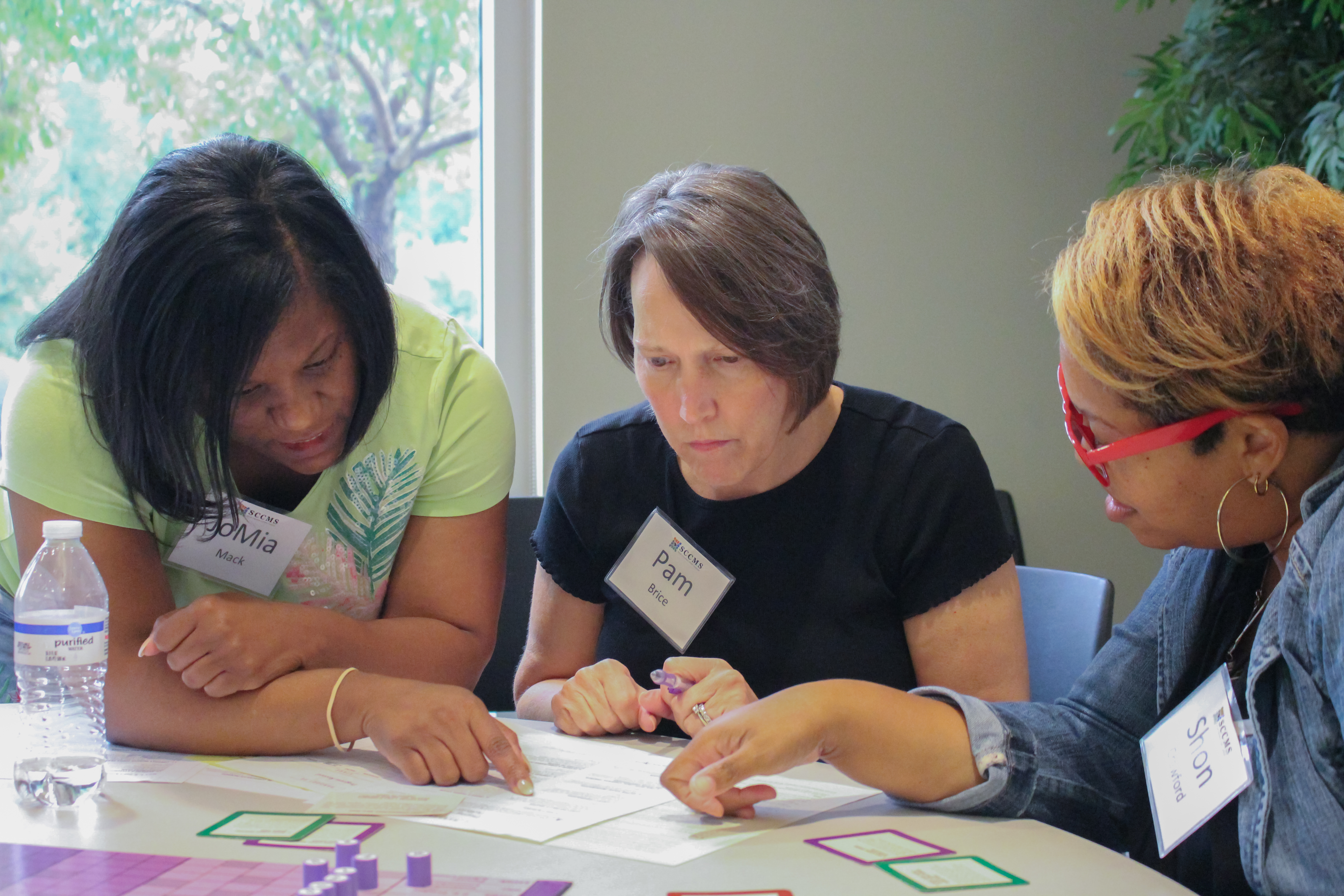 Three woman collaborating